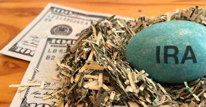 Hundred Dollar Bills with IRA Nest Egg