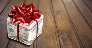 Gift box wrapped in $50 bill